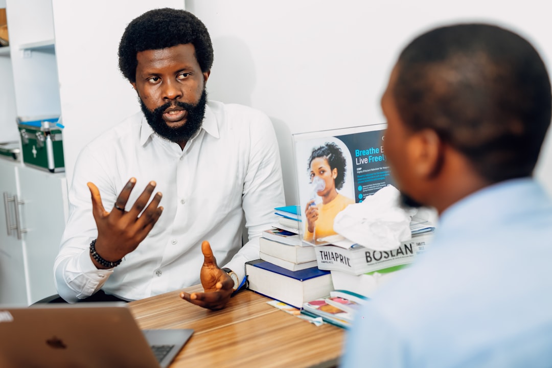 Two people in a clinical conversation